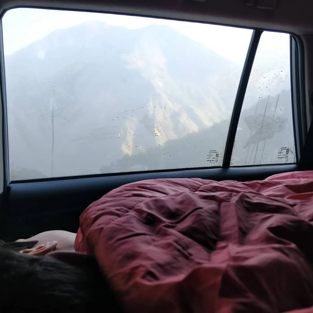 The kids will soon wake up to this view.

The three of us squeezed in at the back tonight. M1 just snuggled in between me and M2 after we had slept. The idea always was for one kid