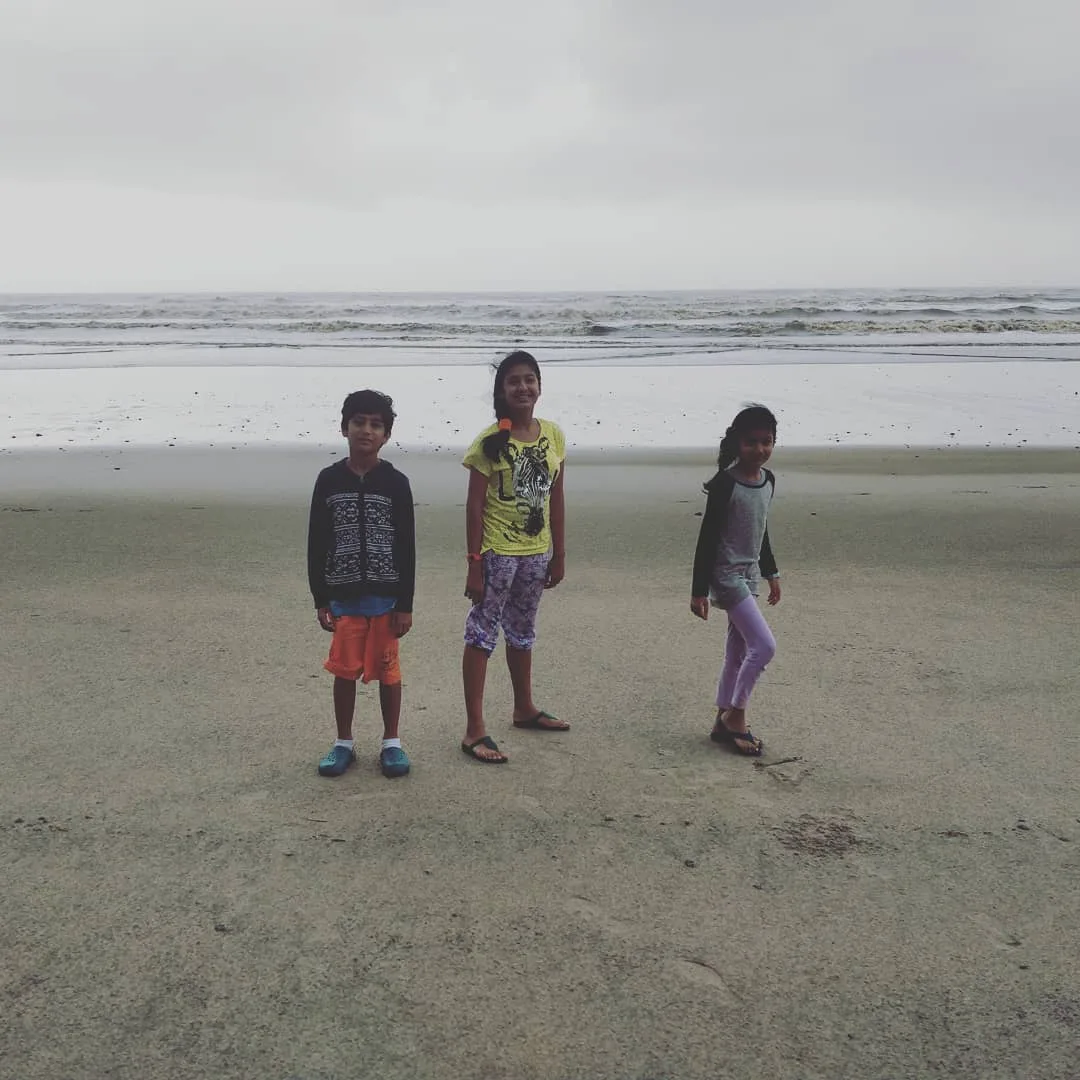Even though the #children can't venture into the #sea, they are still #excited to see it after a long #road trip.