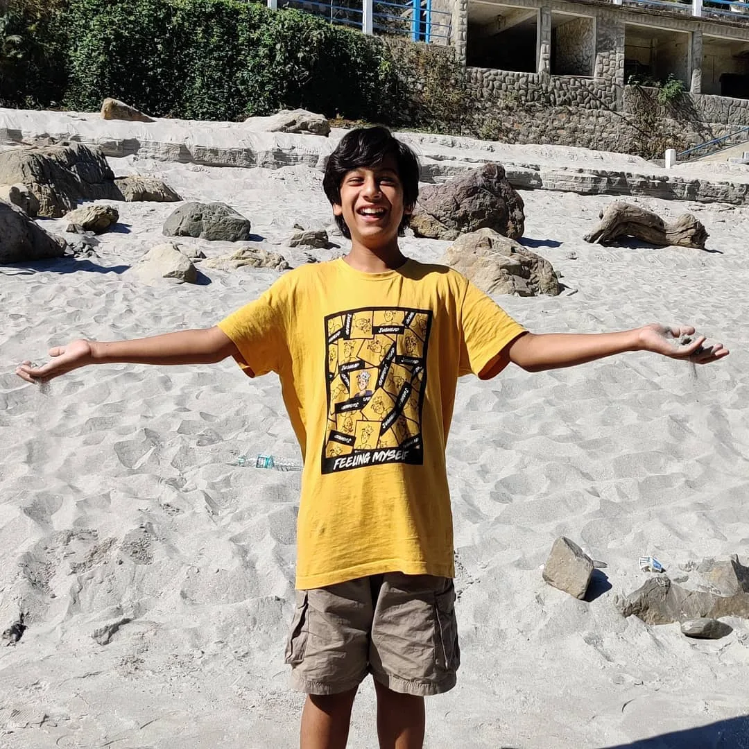 I guess the walk was well worth it. Sand=Joy!