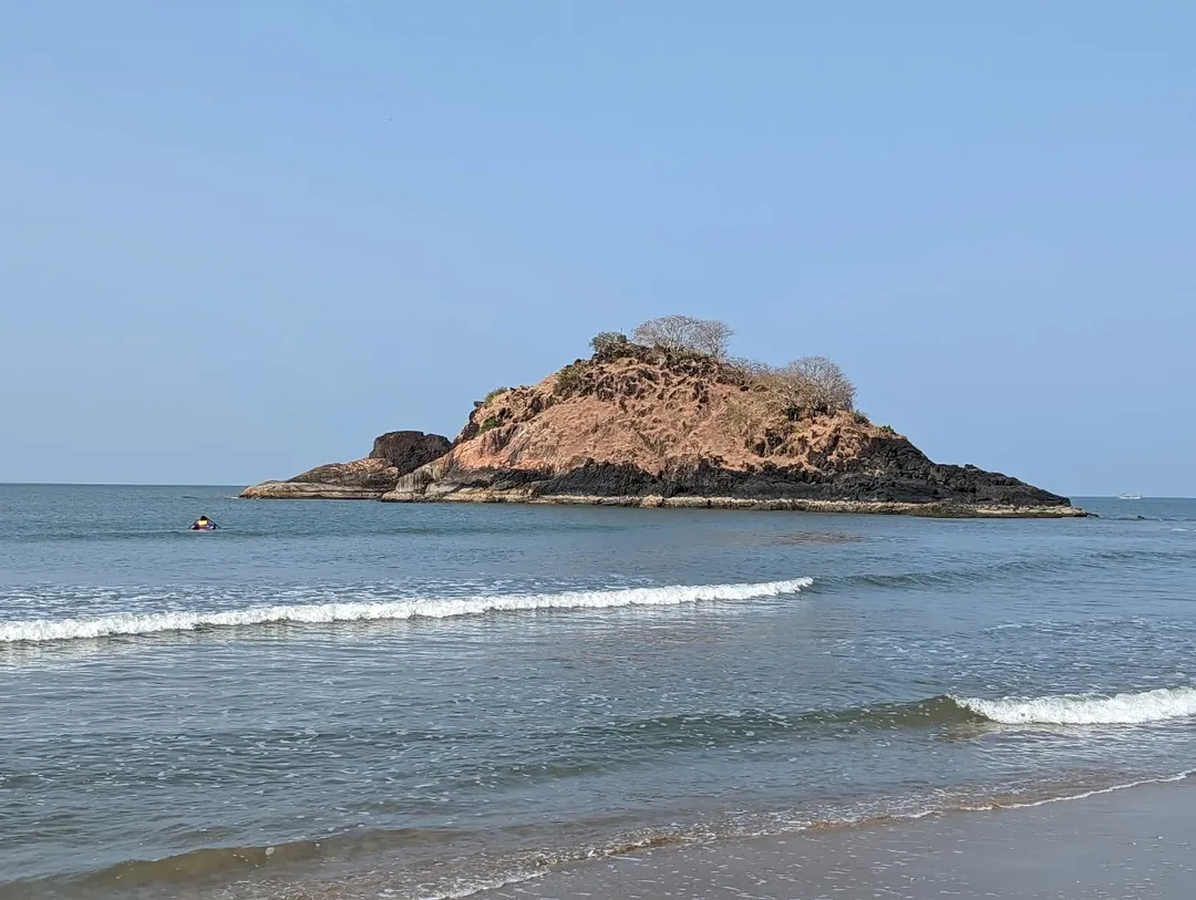 The elder one dialed things up a couple of notches and took the dinghy out into the sea. The island was too rocky and he couldn't find a place to tether his boat, so he came back. 