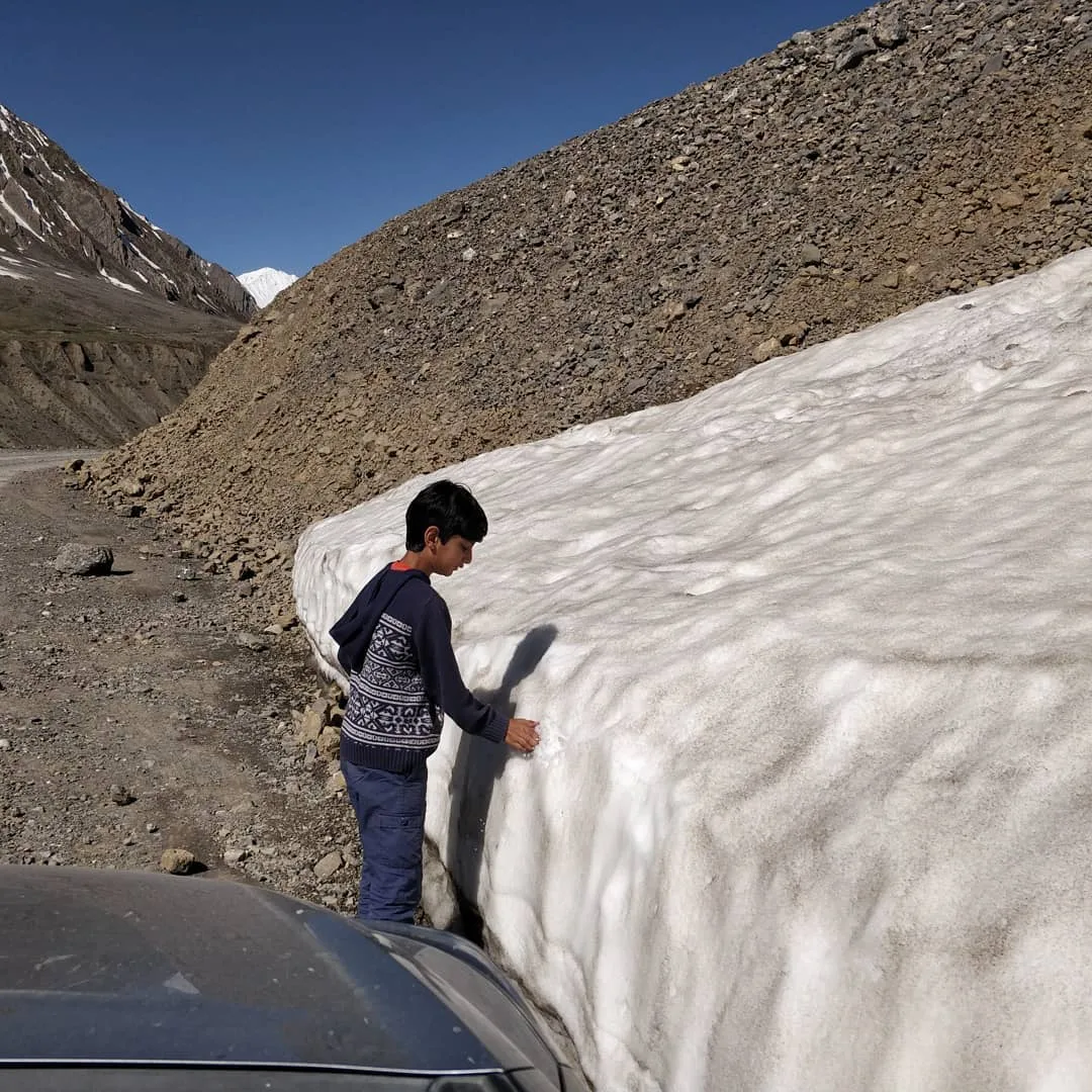 Earlier today we found snow. More like glacier ice. In #PinValley. Made for a happy kid.