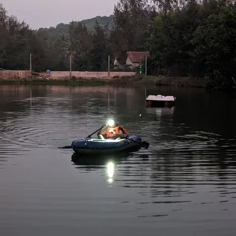 M1. Boating. With a headlight. On an inflatable boat we picked up five years ago and never got to use. Till today. Big d