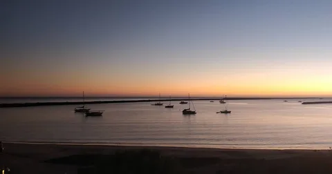 #boats against a setting sun