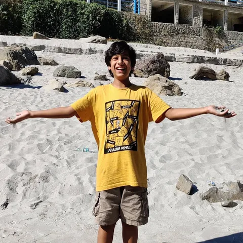 I guess the walk was well worth it. Sand=Joy!