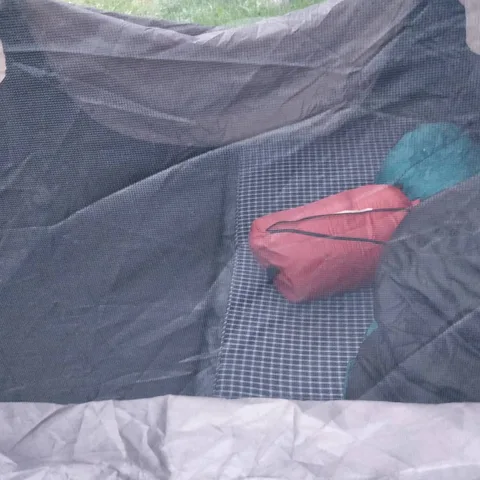 The #tarp is laid out. The instant #tent is popped up. The foam #mattresses have been laid out in the tent. And the slee