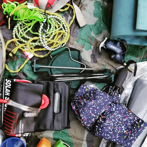 Here's a whole bunch of closeups of our gear. Safety stuff, backpacks, cooking stuff, pillows, umbrellas, etc. Are we mi