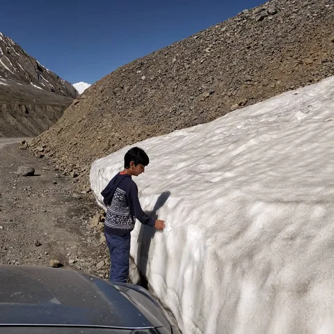 Earlier today we found snow. More like glacier ice. In #PinValley. Made for a happy kid.
