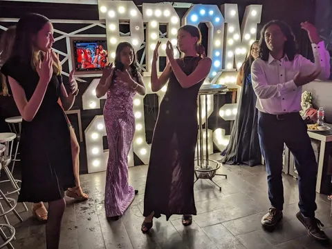 They're having a prom!

(No, they haven't finished school yet.)